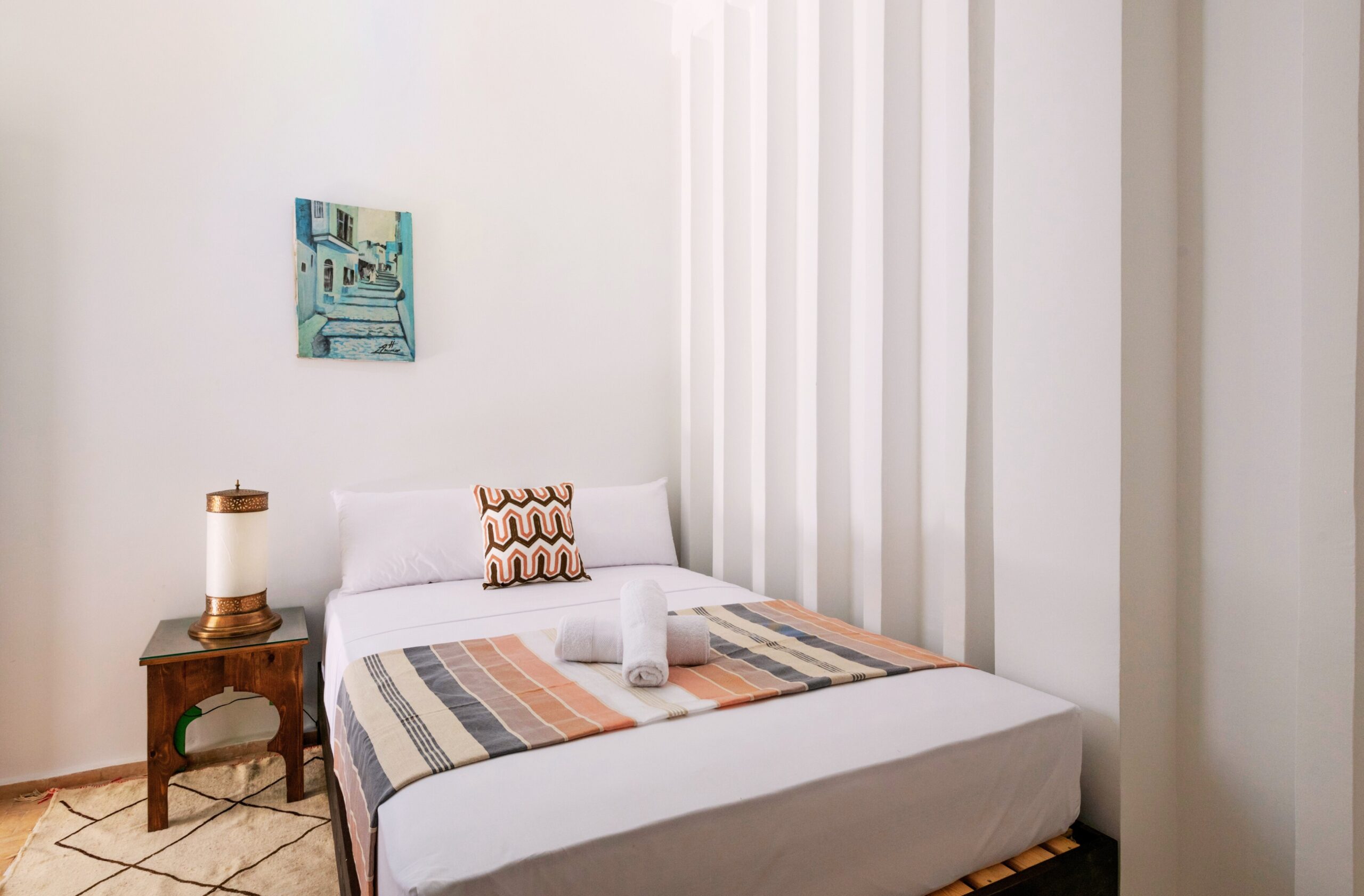 Our Rooms 33 Earthy tones and carved wood reflect Moroccan heritage.